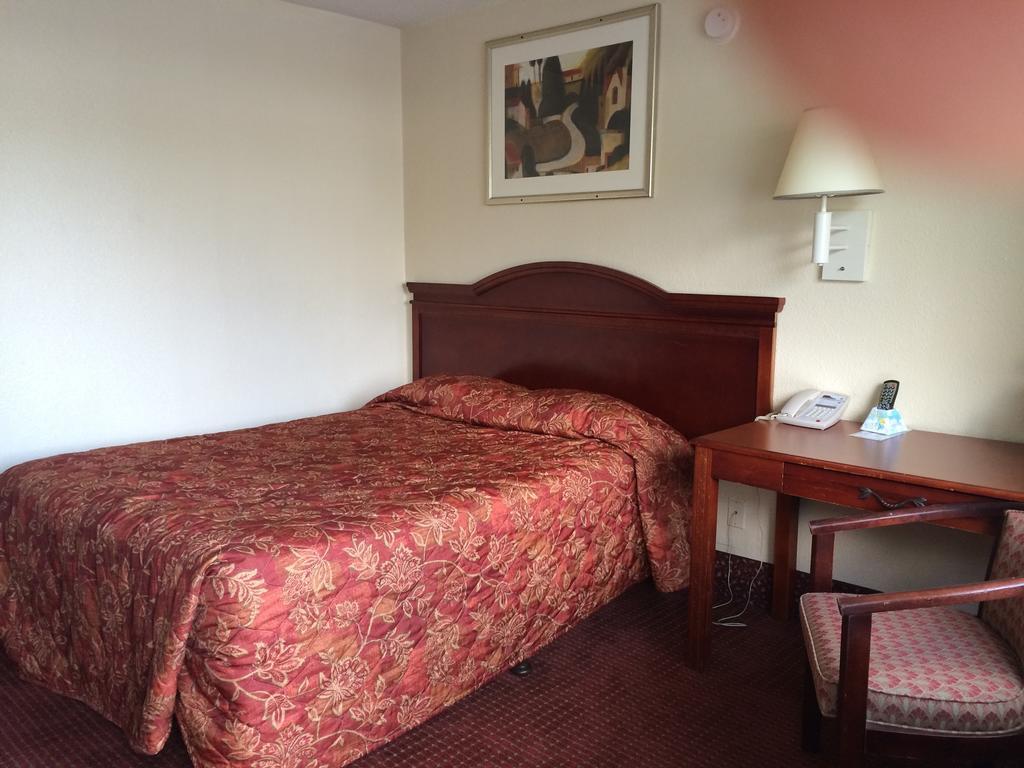 Carpet Inn Опелика Экстерьер фото