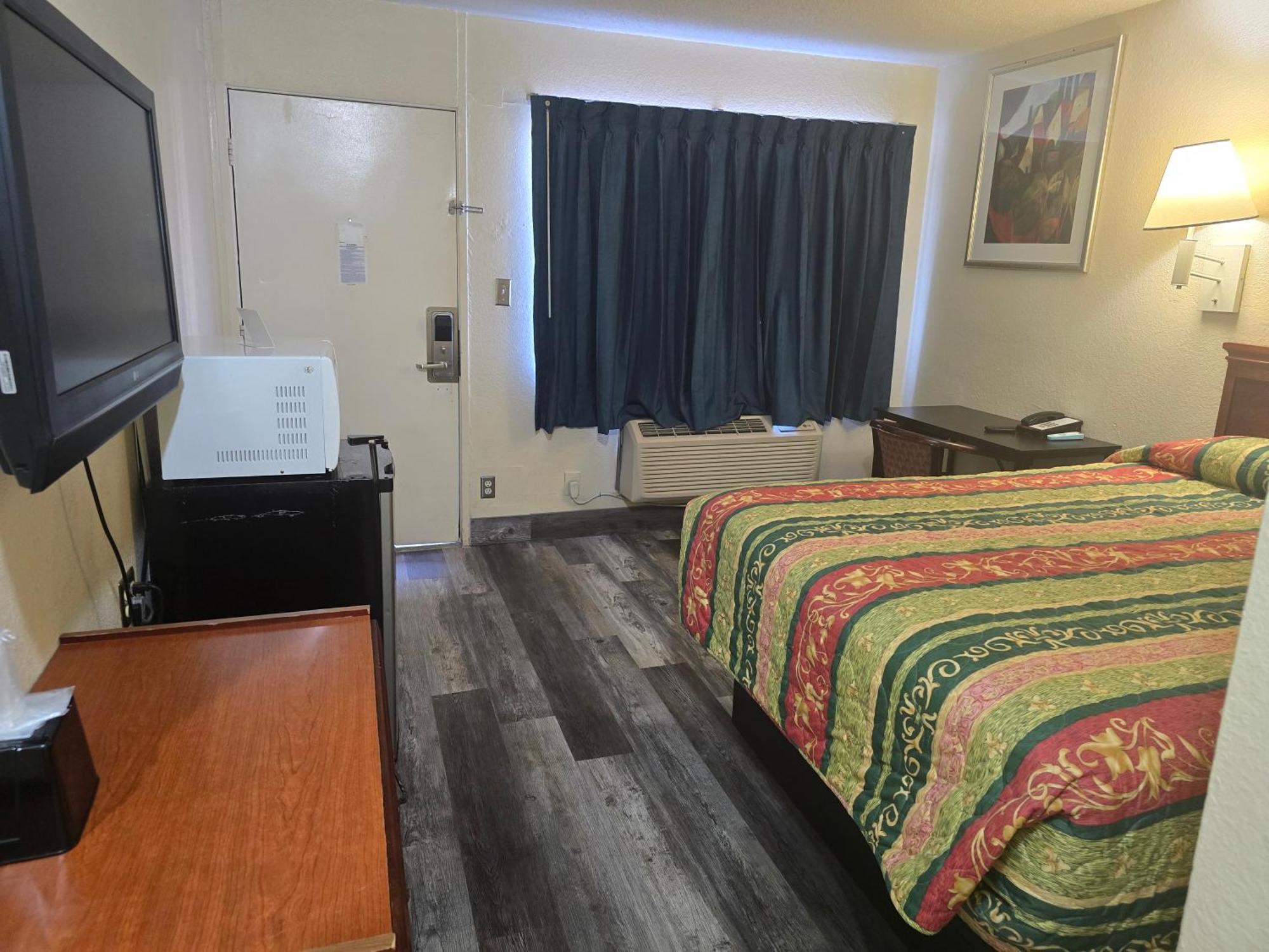 Carpet Inn Опелика Экстерьер фото